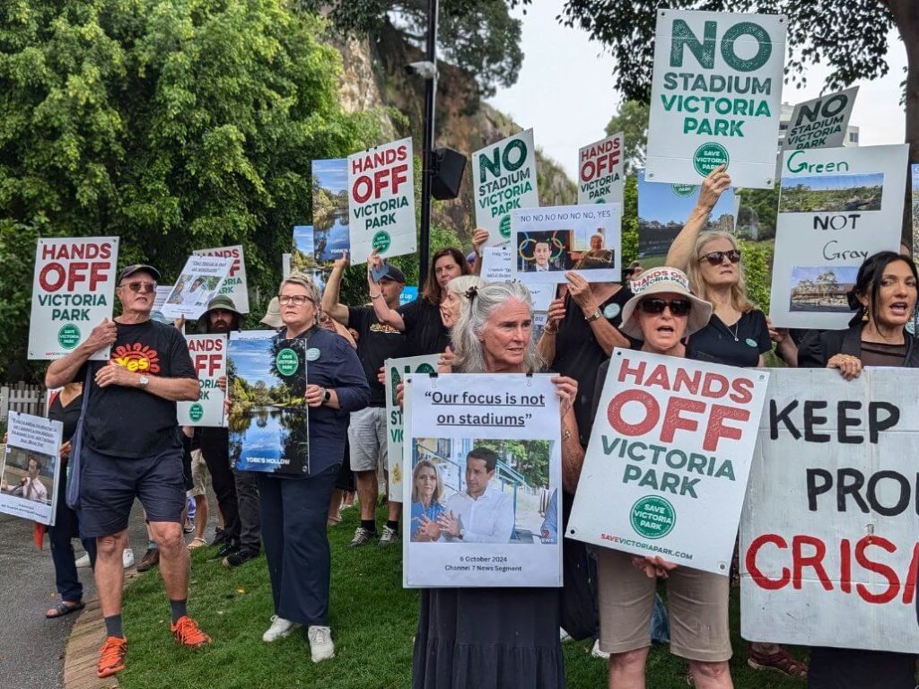 Protesters challenge plans to destroy park and sacred Aboriginal site for Brisbane Olympics